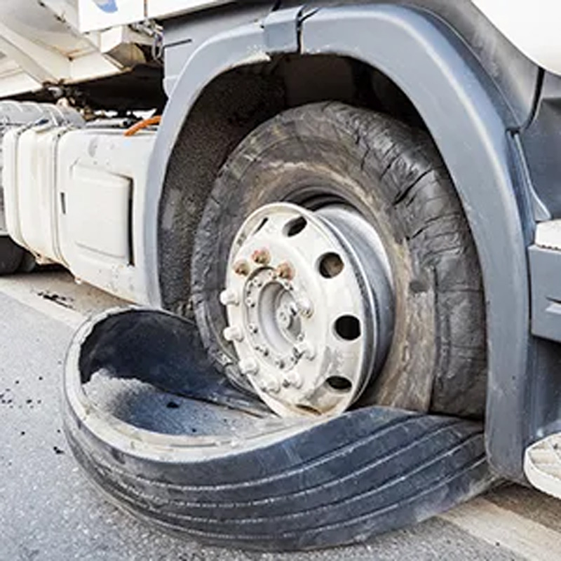 tire tore off a rim of a vehicle