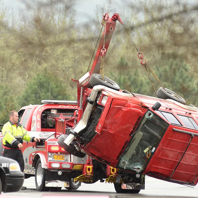 tow truck lifting a car